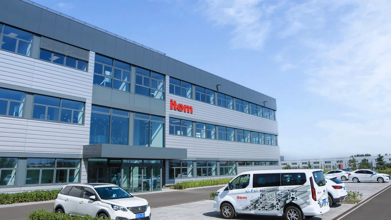 item Qingdao building exterior with company vehicles