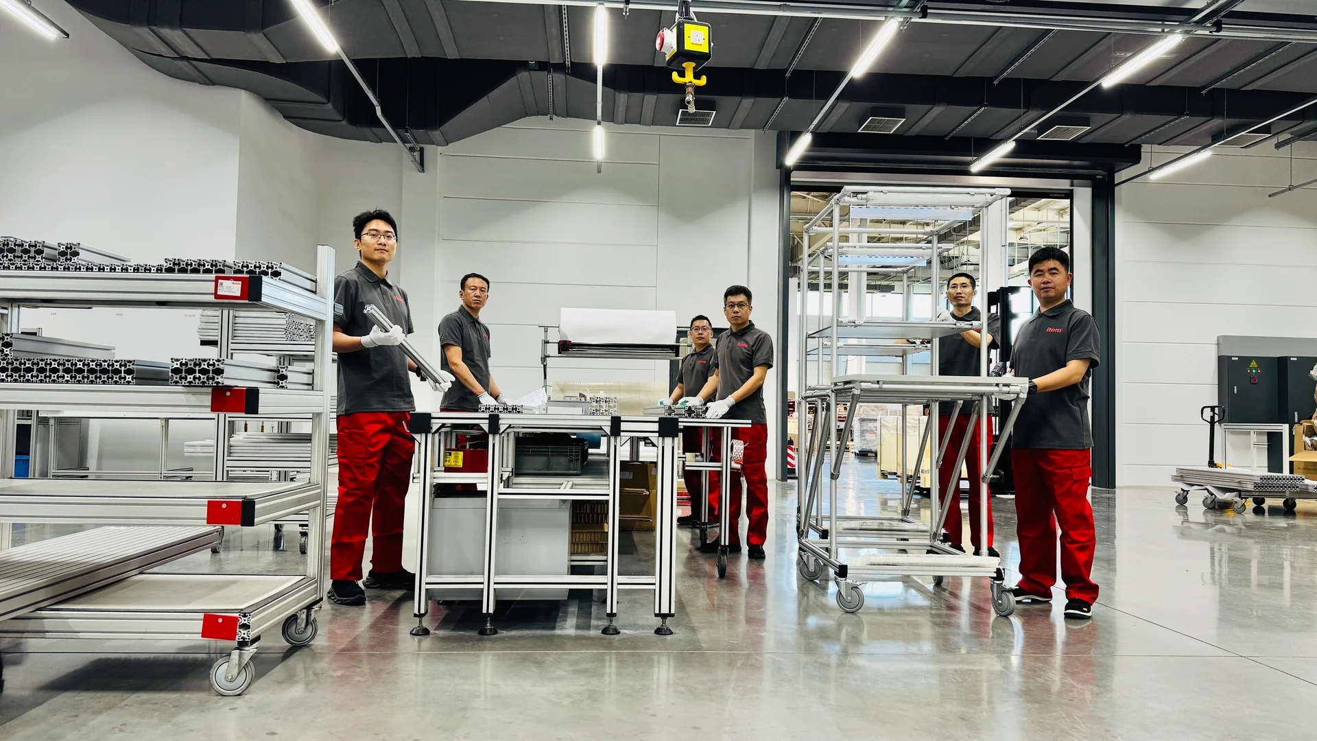 item China colleagues working with modular industrial equipment